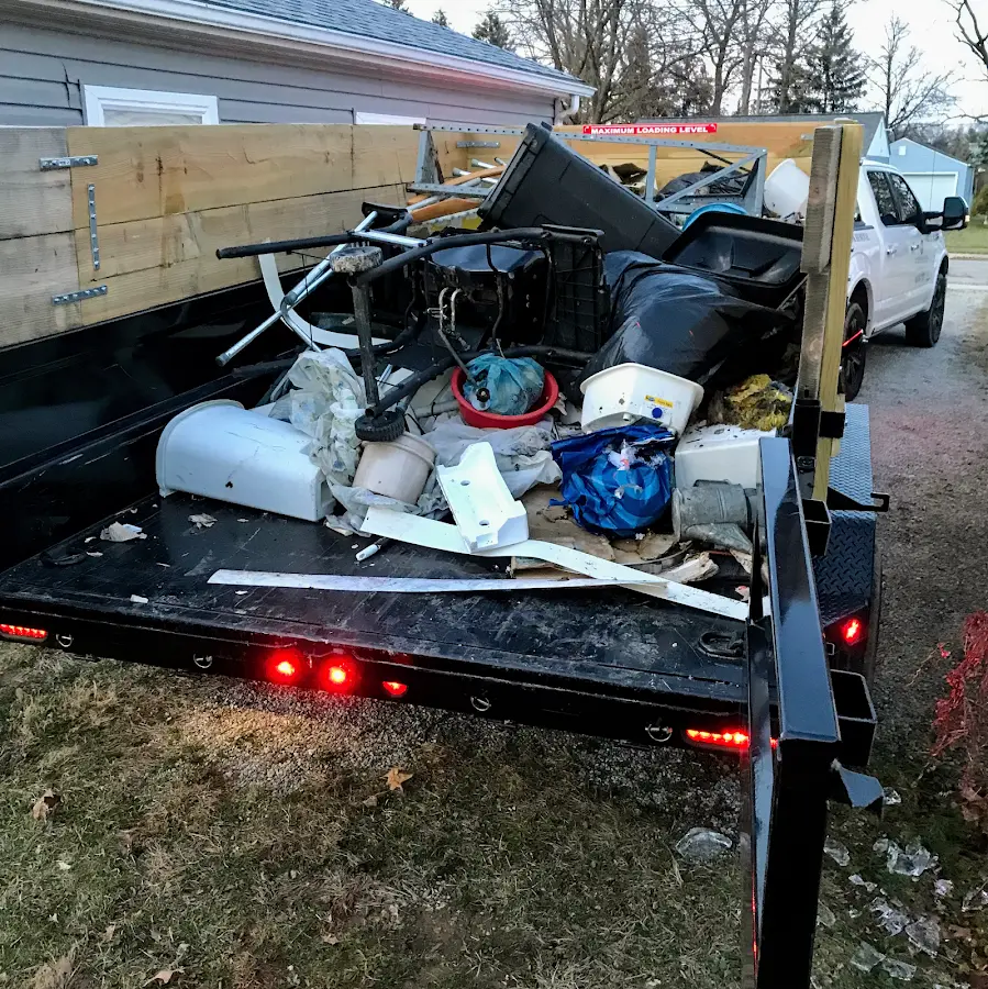 Roll-off dumpster delivered to a residential driveway in Robinson